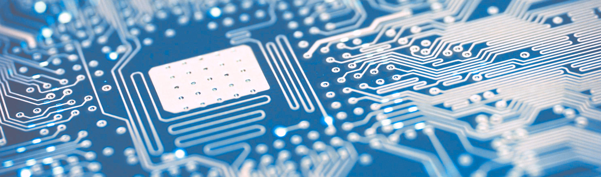 Close-up of a blue circuit board.