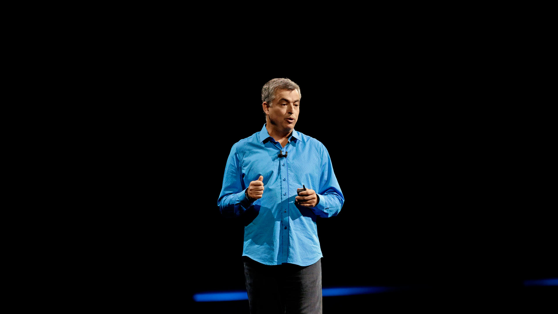 Craig Federighi speaking at an Apple event.